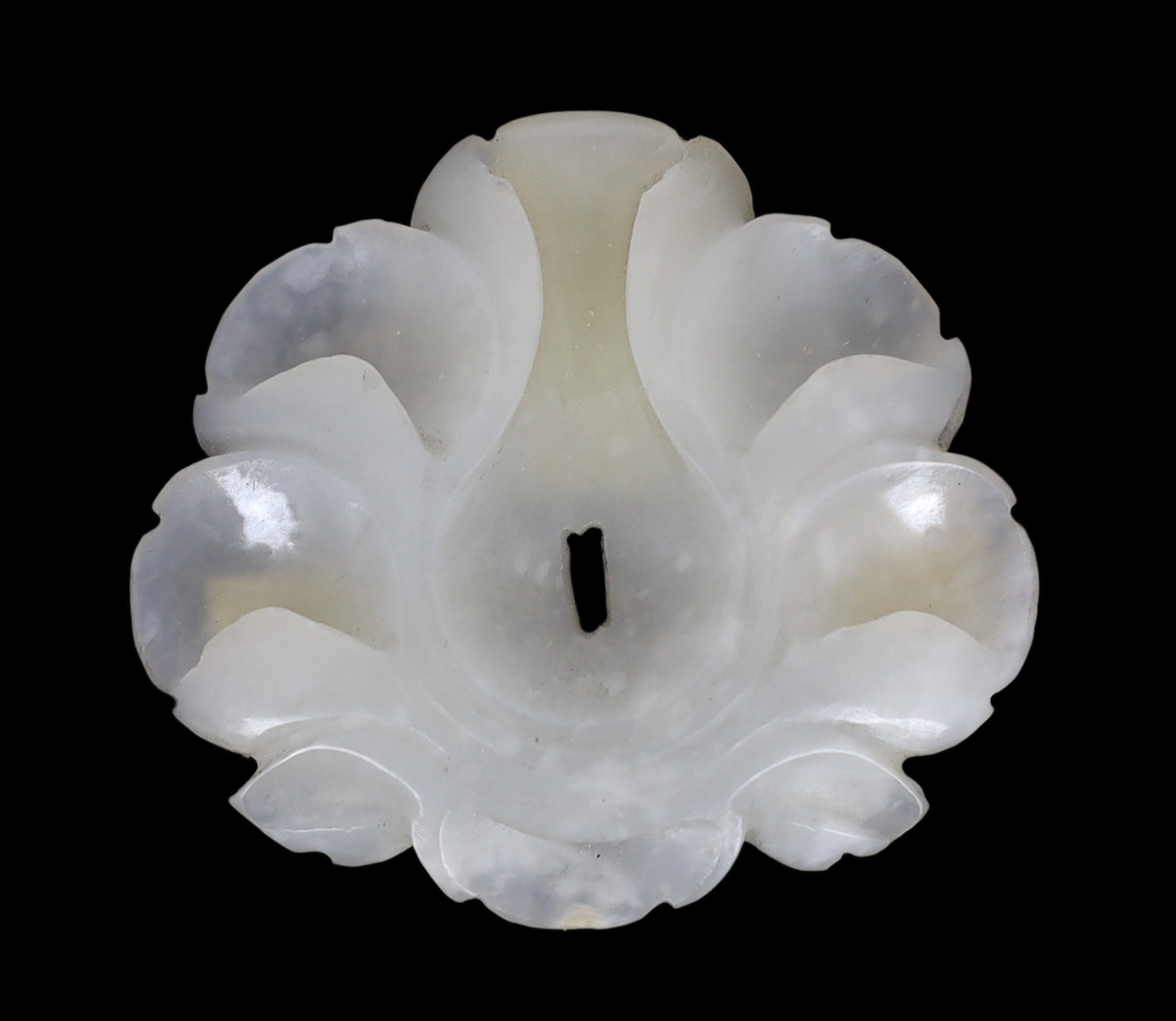 A Chinese small white jade flower head, Song/Yuan dynasty, 12th/13th century